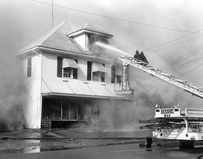 Firefighters Richie Lostritto and Harry Cubbellotti were on Ladder One that day.  (Photo by John Mongillo, Jr.)